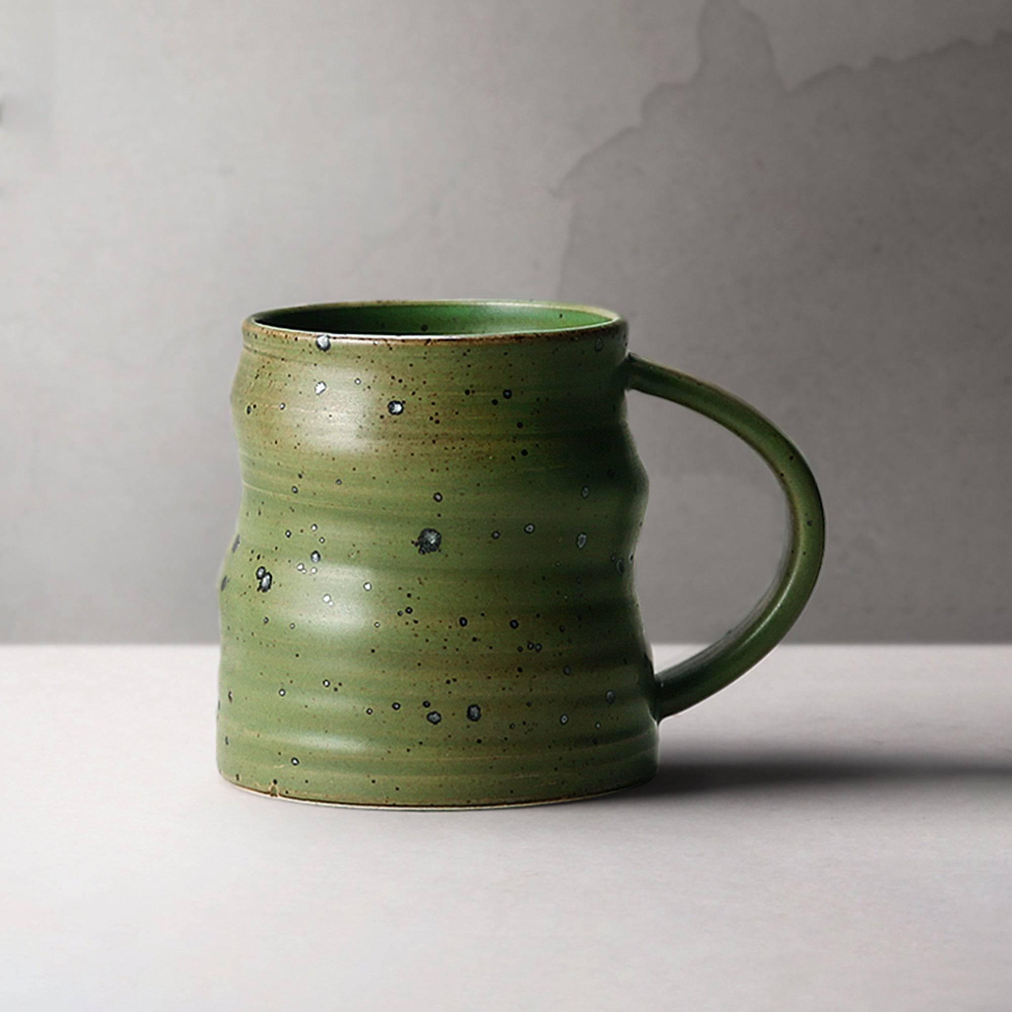 http://eunaliving.com/cdn/shop/products/japanese-style-handmade-rough-pottery-personalized-coffee-cup-eunaliving-5.jpg?v=1661417909