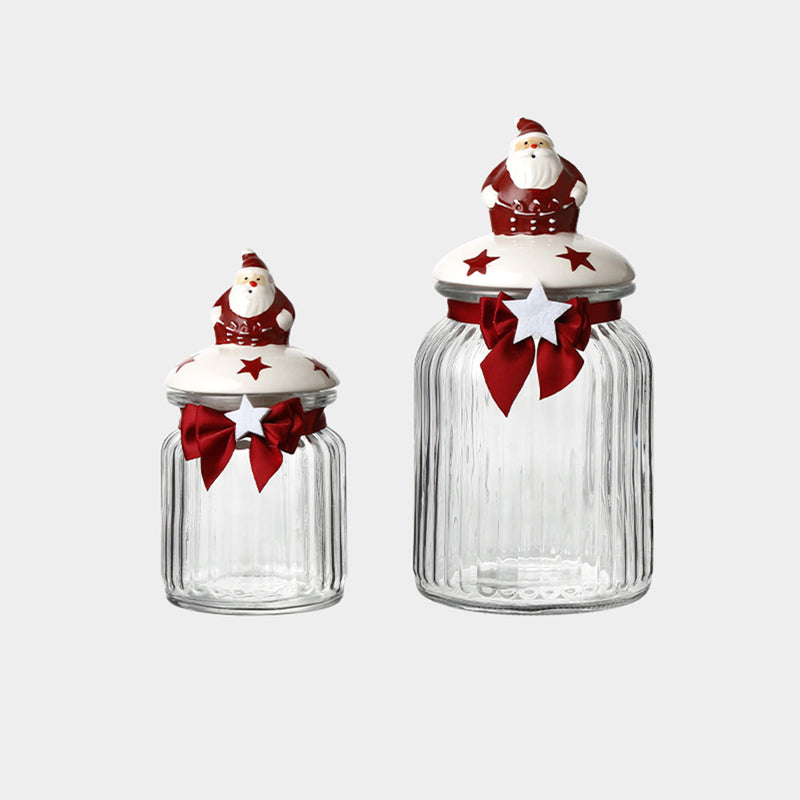 Christmas Crackers, Nuts And Candies In Glass Jars