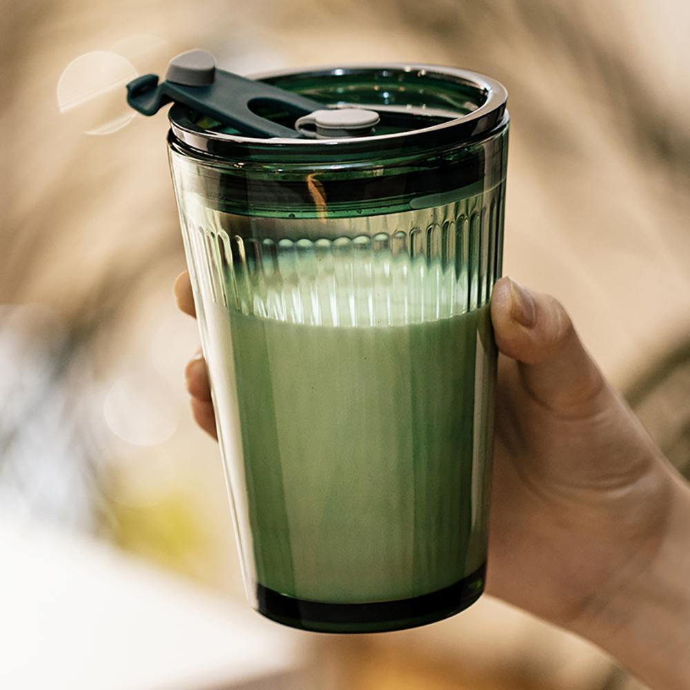 https://eunaliving.com/cdn/shop/products/dark-green-glass-water-cup-with-straw-eunaliving-869707.jpg?v=1663833913