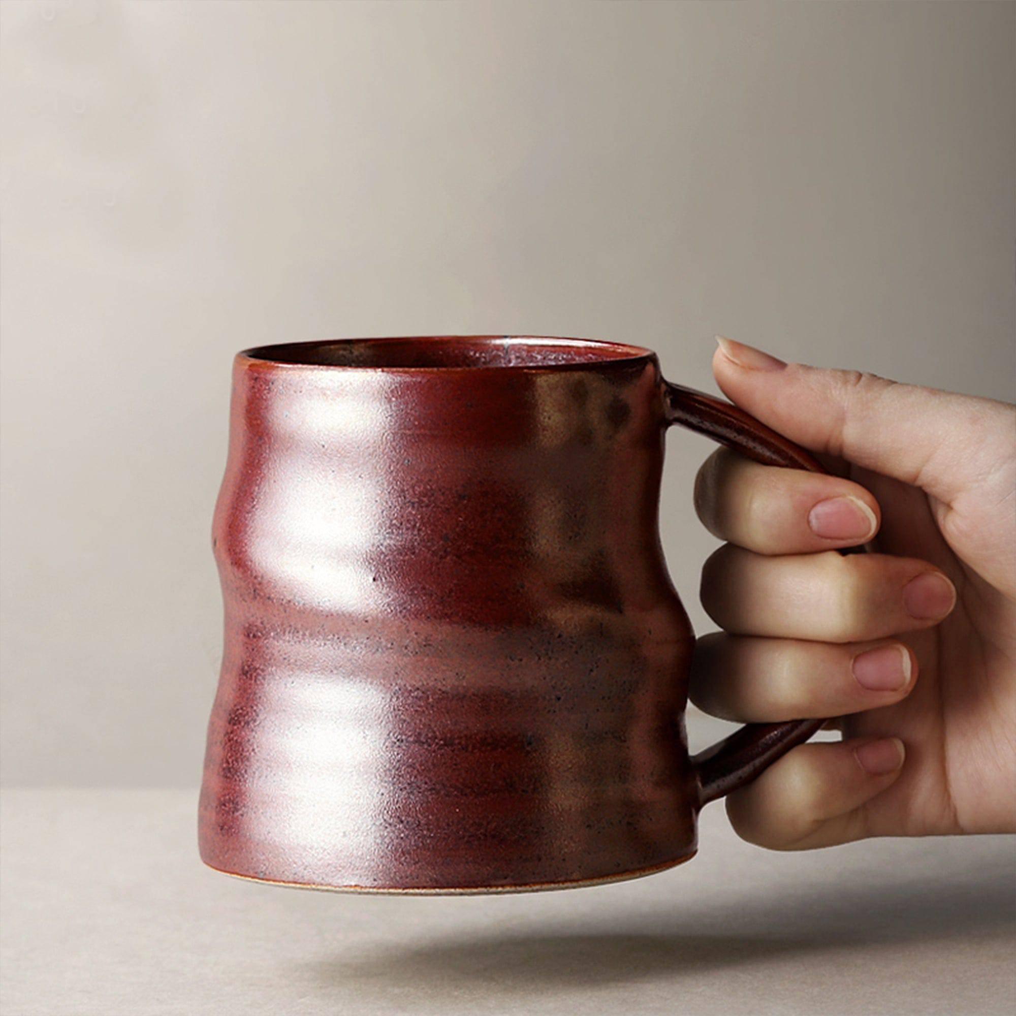 https://eunaliving.com/cdn/shop/products/japanese-style-handmade-rough-pottery-personalized-coffee-cup-eunaliving-11.jpg?v=1661417909