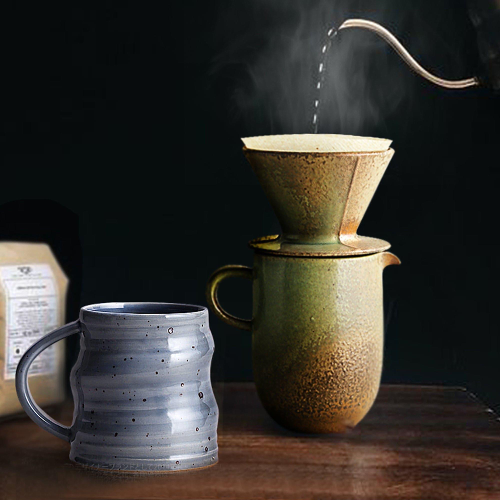 https://eunaliving.com/cdn/shop/products/japanese-style-handmade-rough-pottery-personalized-coffee-cup-eunaliving-12.jpg?v=1661417909