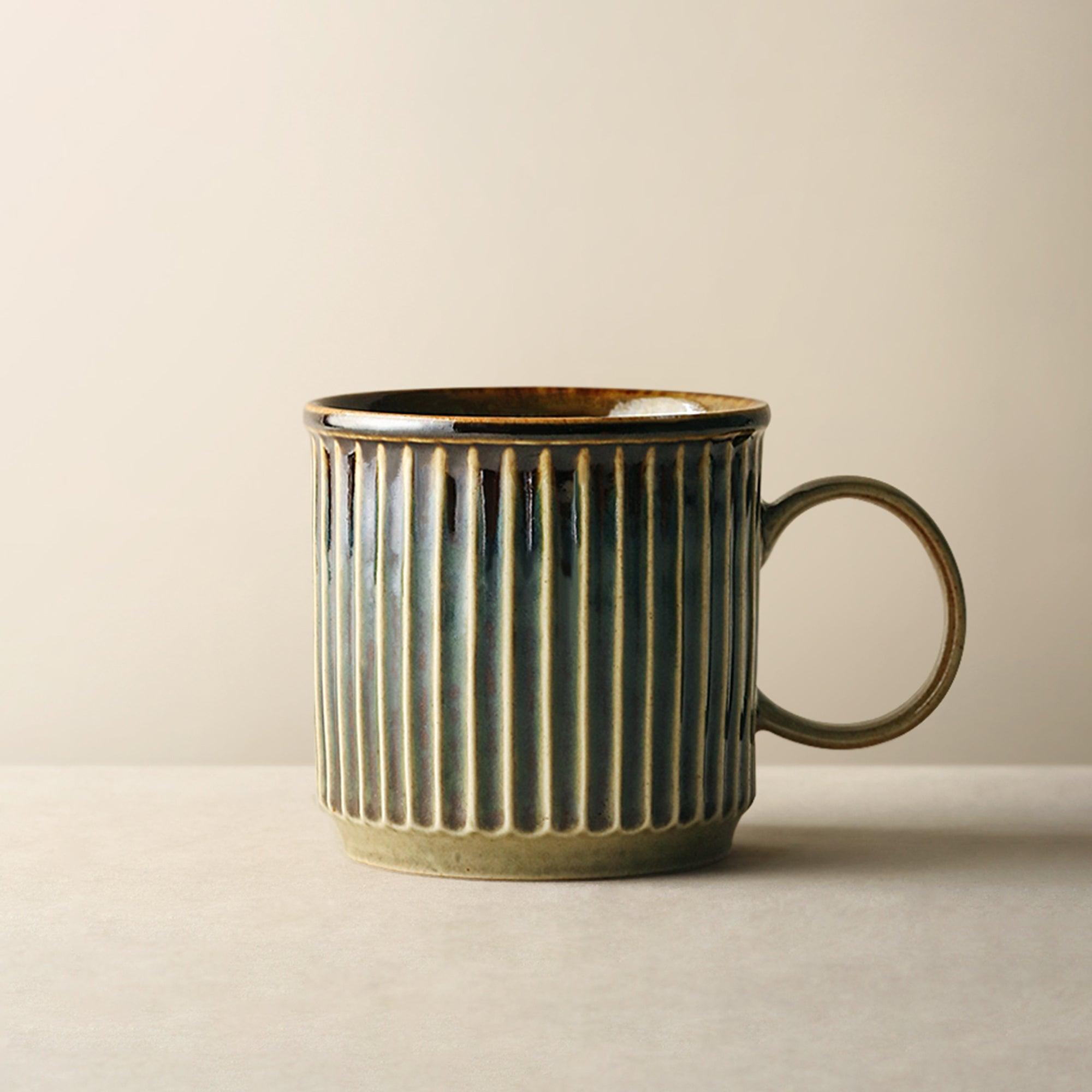 https://eunaliving.com/cdn/shop/products/japanese-vintage-coffee-mug-eunaliving-2.jpg?v=1656836762