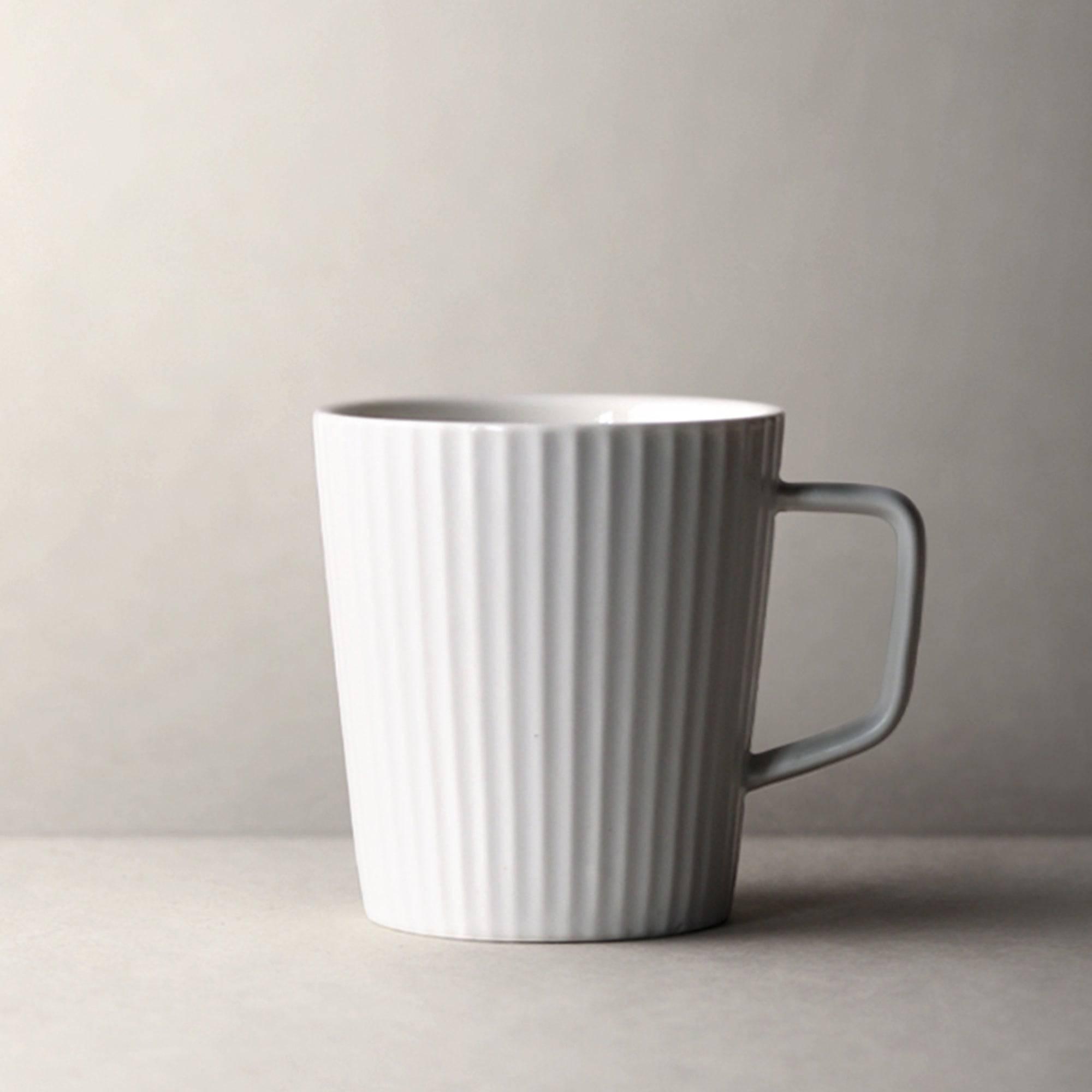 https://eunaliving.com/cdn/shop/products/scandinavian-handmade-minimalist-mug-set-eunaliving-3.jpg?v=1656838735